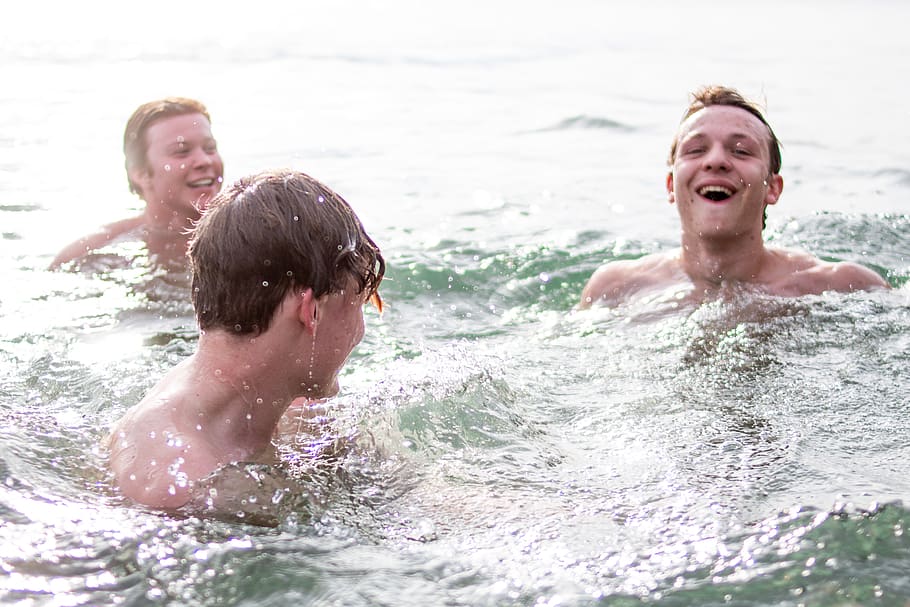 three men smiling while swimming during daytime, males, childhood HD wallpaper