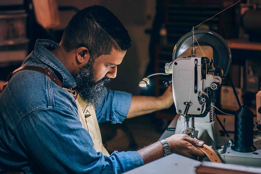 man sewing brown belt, male, machine, textiles, working, worker