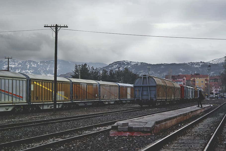 Train Running on Train Track Under Gray Sky at Daytime, cargo HD wallpaper
