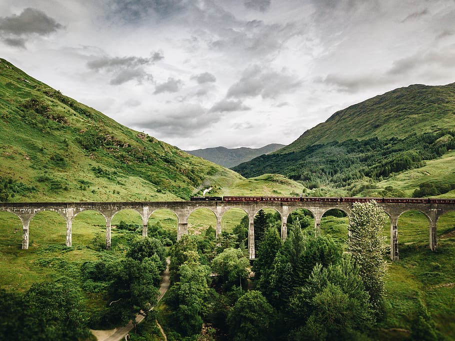 train passing by bridge over mountains, cloud - sky, nature, scenics - nature HD wallpaper