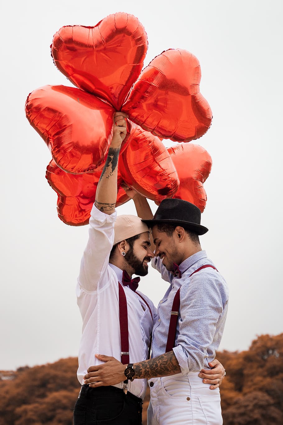 Man Facing Another Man While Holding Balloons, couple, happiness HD wallpaper