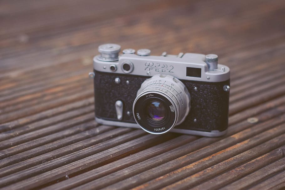 Black and Gray Film Camera on Brown Wooden Surface, antique, close-up HD wallpaper