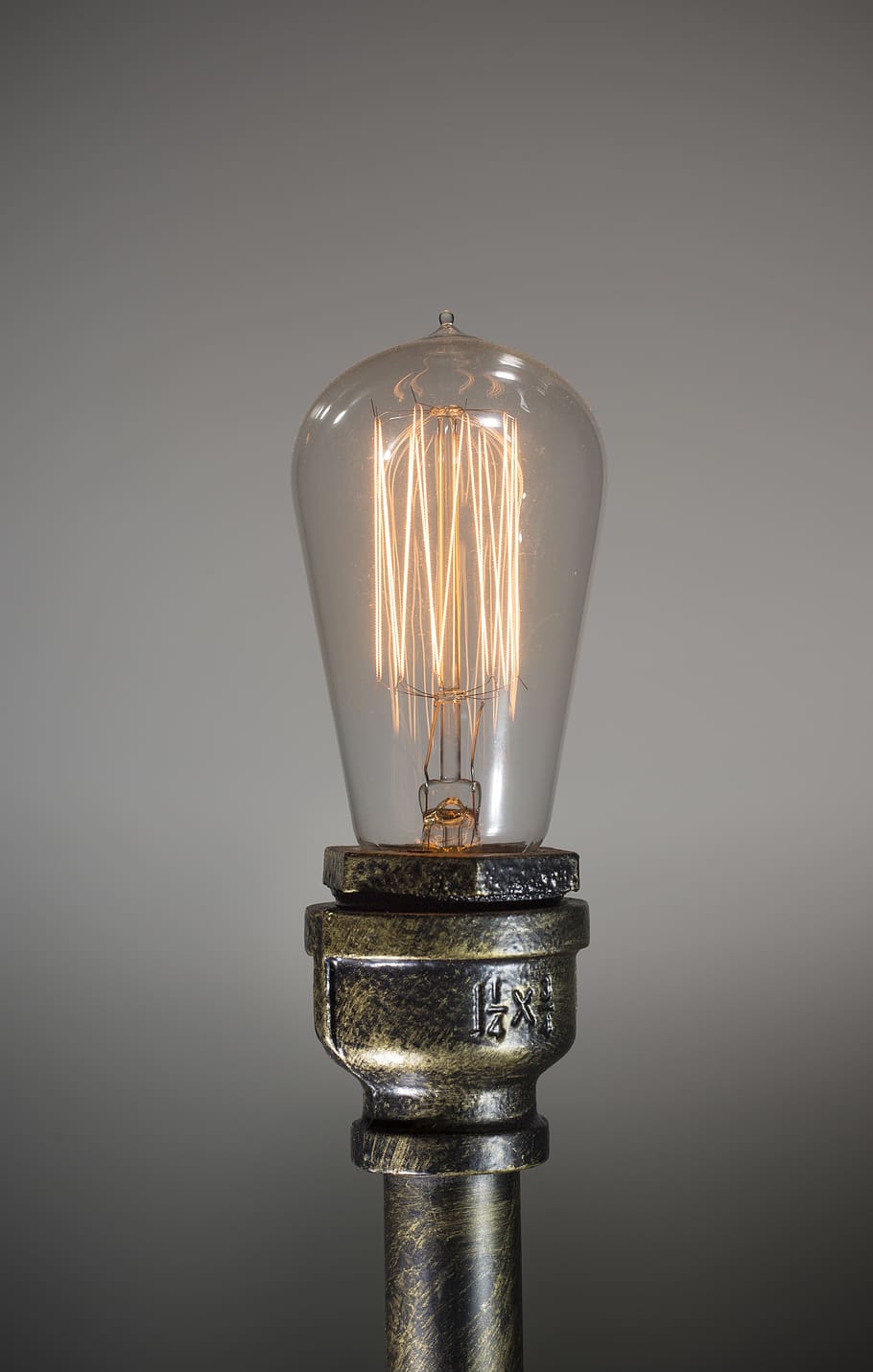 lighted light bulb, lightbulb, lamp, metalic, industrial decor HD wallpaper