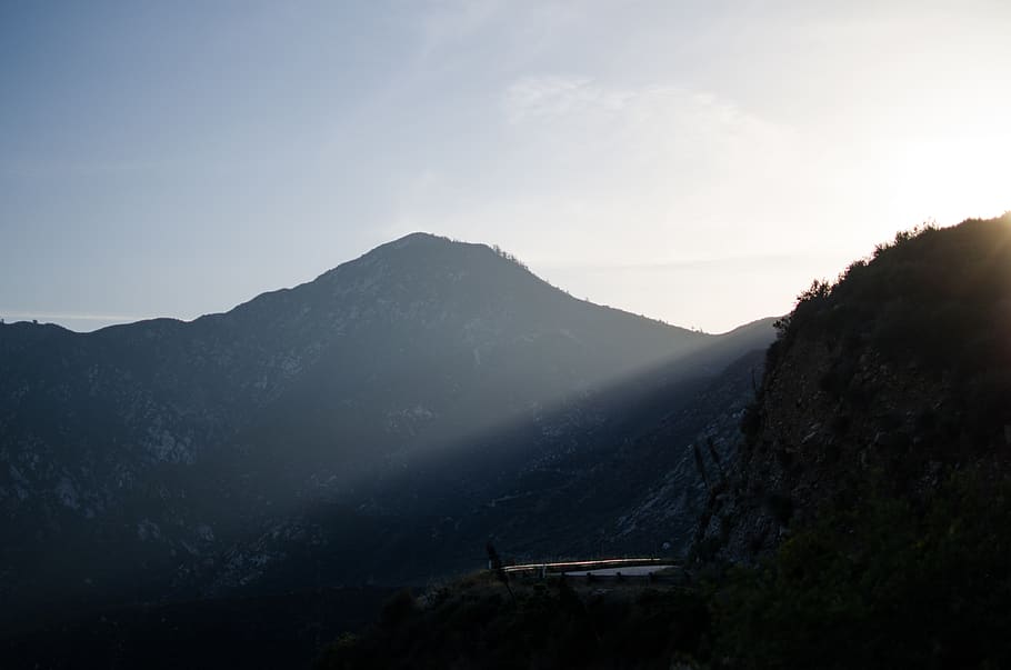 mountain, sunset, dark, haze, bright, light, sky, scenics - nature HD wallpaper