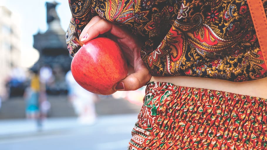 person holding red apple, london, united kingdom, piccadilly HD wallpaper