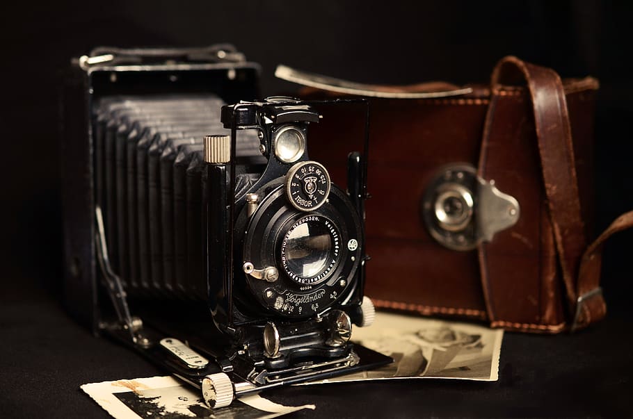 Black Classic Camera Near Brown Leather Bag, antique, nostalgia HD wallpaper
