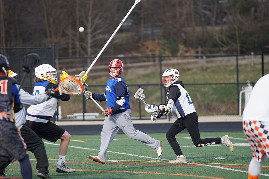 men playing on field, apparel, helmet, clothing, person, human HD wallpaper