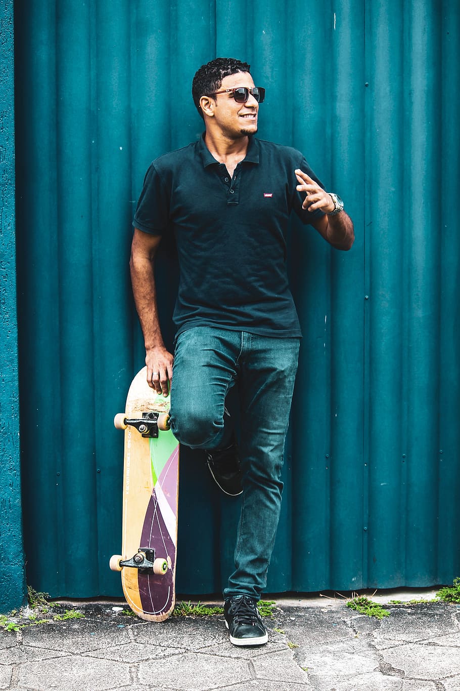 man in black polo shirt leaning with skateboard, human, person, HD wallpaper