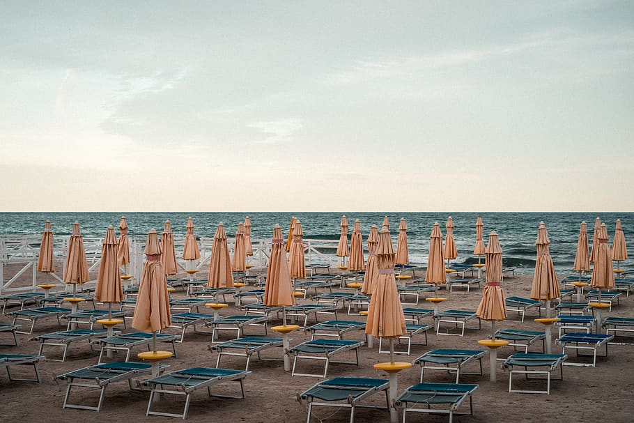 brown umbrella lot, furniture, chair, sea, outdoors, water, nature HD wallpaper