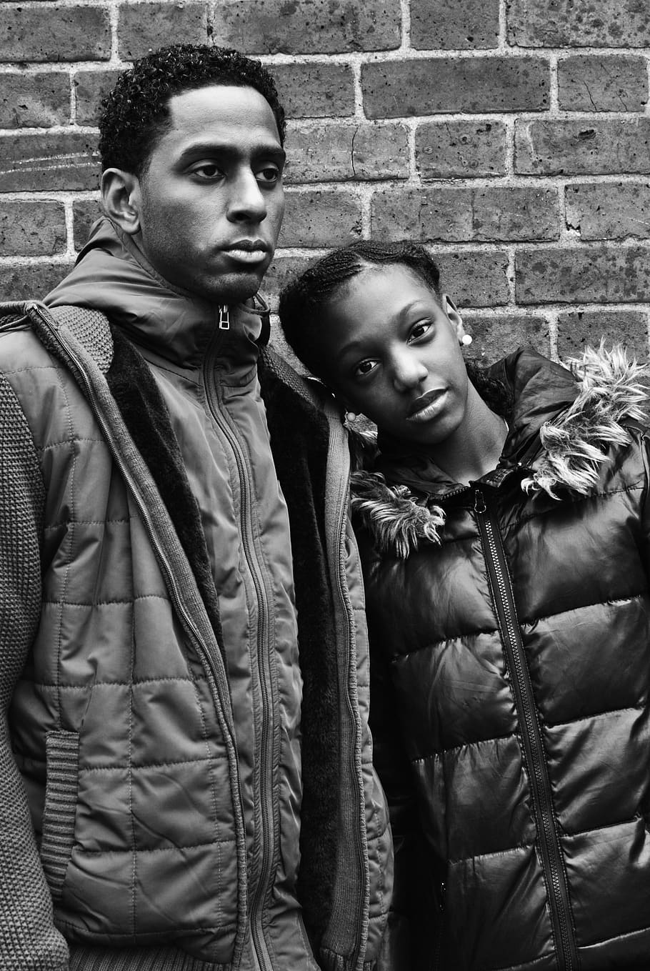 grayscale photography of man beside woman, coat, jacket, clothing HD wallpaper