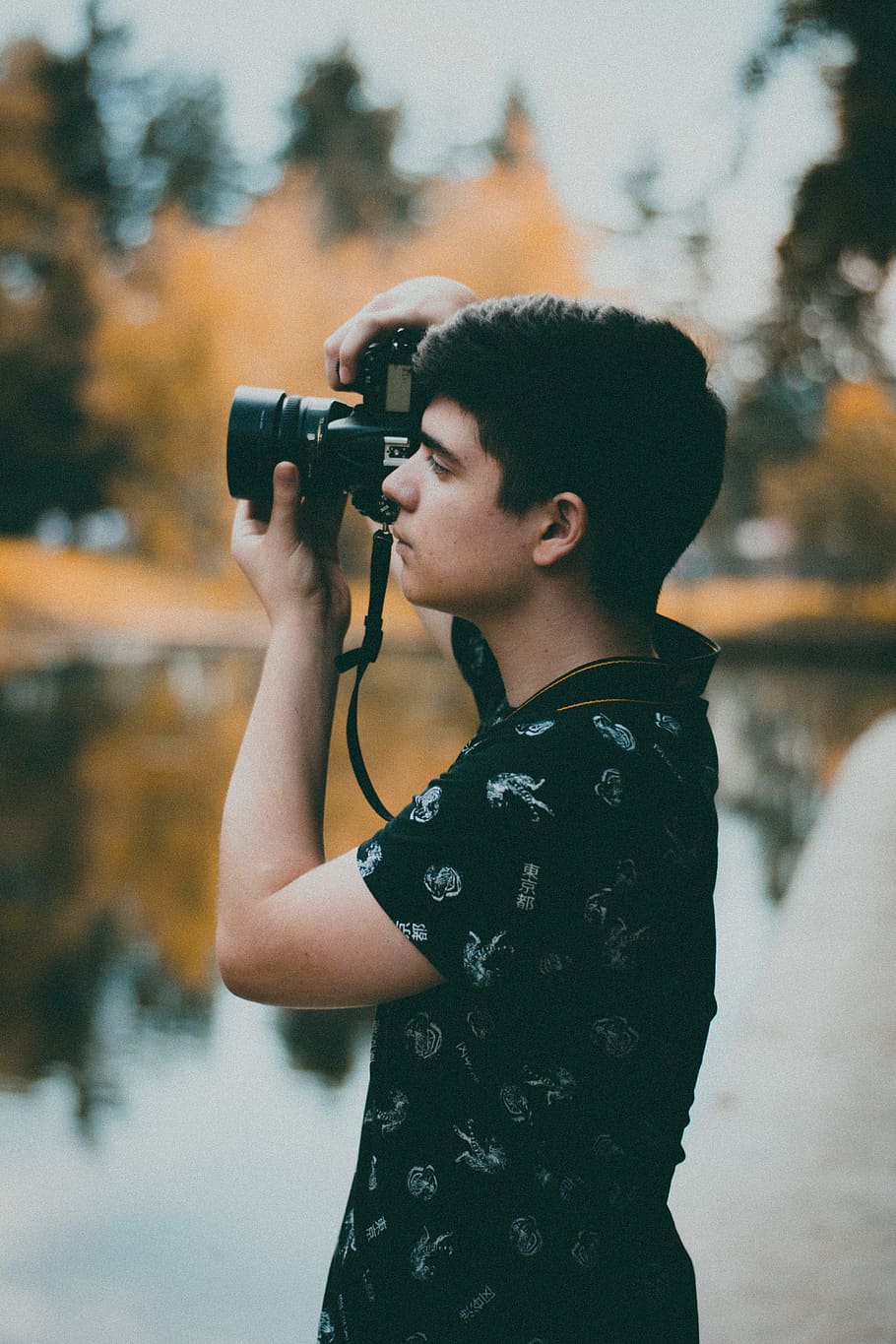 Man Using Camera Near Body of Water, Analogue, digital camera HD wallpaper