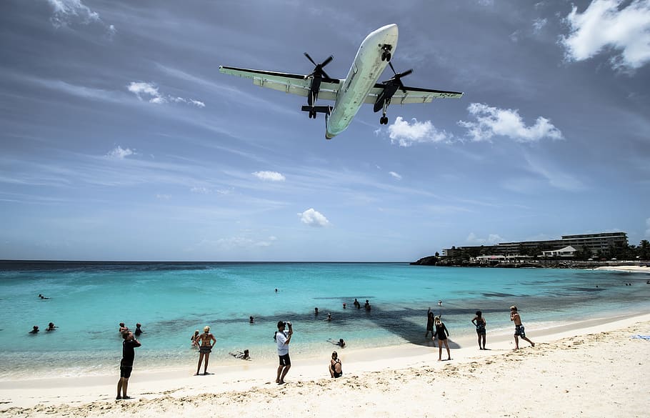 plane flying over seashore during daytime, water, beach, sky HD wallpaper