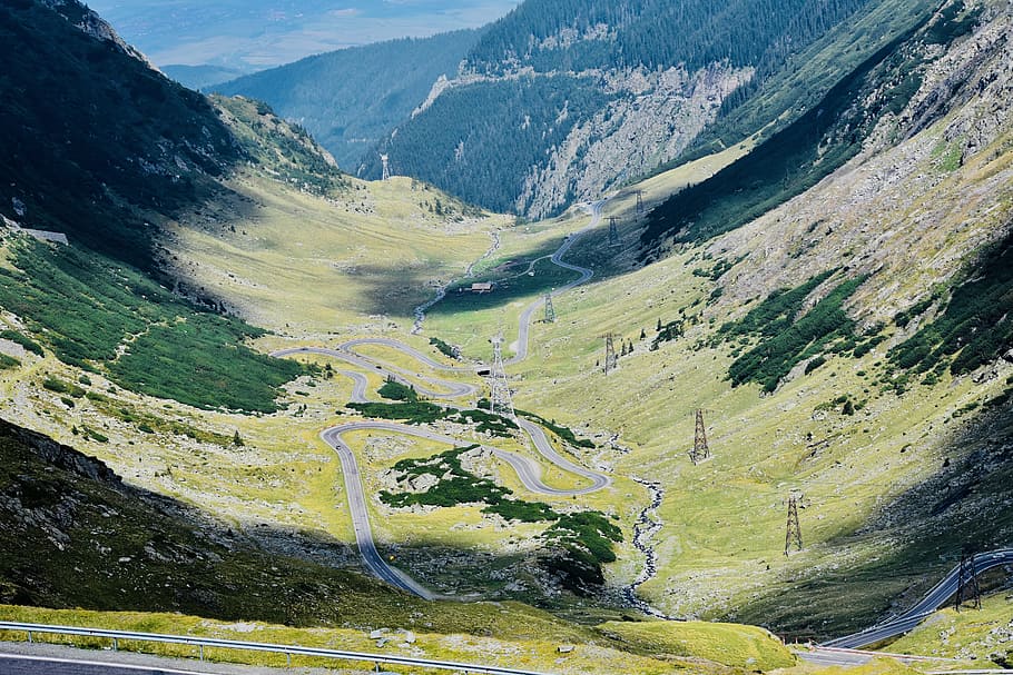 Aerial View Photography of Asphalt Road in Between Mountain, clouds HD wallpaper