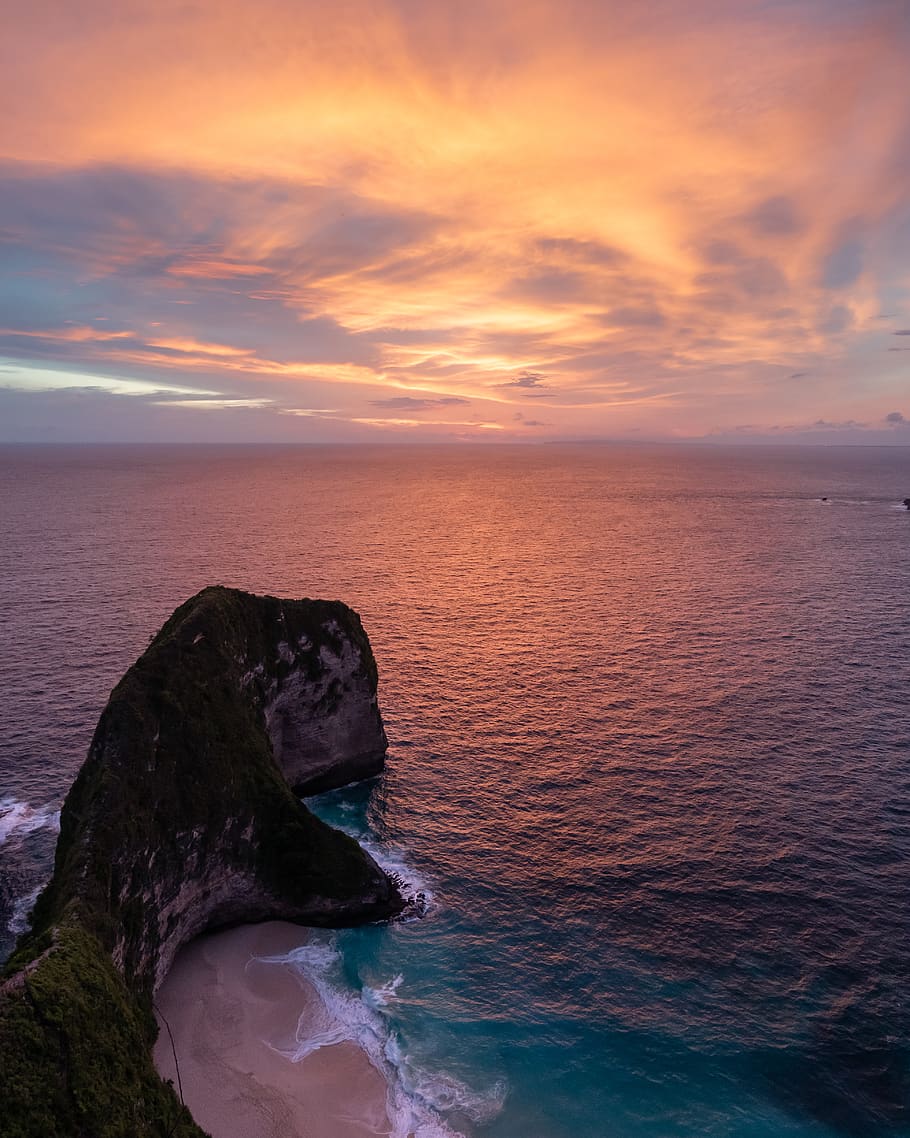 dinosaur-shaped island beside sea, water, sunset, sky, beauty in nature HD wallpaper