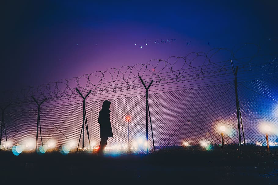 dark, night, sky, lights, wire, fence, people, man, alone, silhouette HD wallpaper