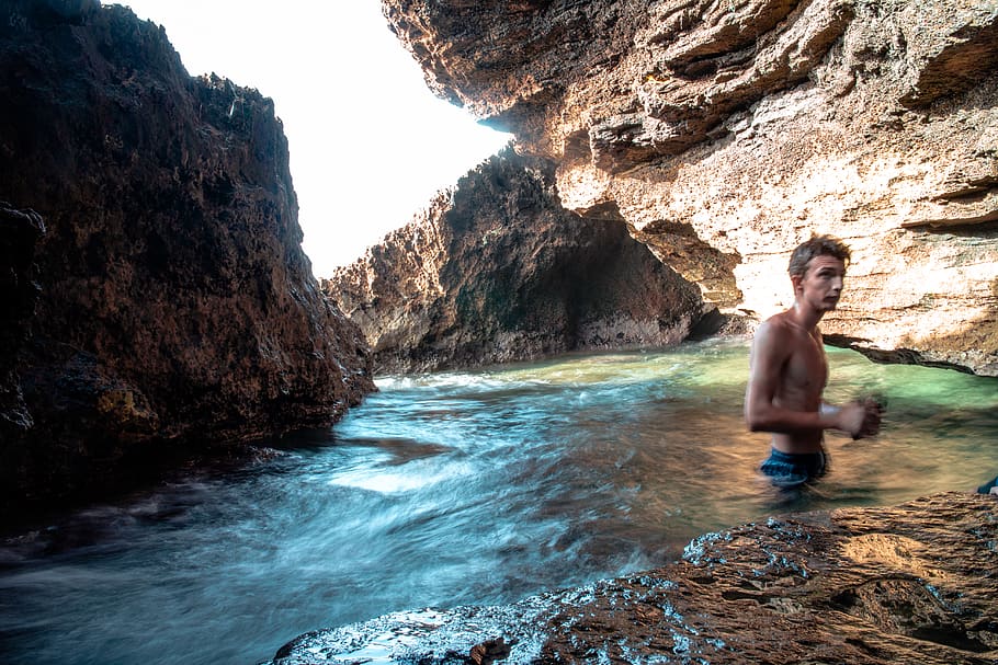 algeria, sea, blue, boy, the sea, cave, cavern, man, rock, rock - object, HD wallpaper