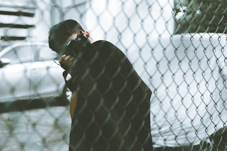 one person, real people, chainlink fence, standing, barrier HD wallpaper