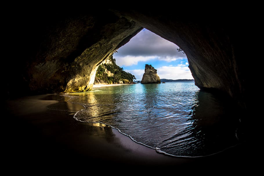 Gray and Brown Cave Near on the Ocean, beach, clouds, dark, daylight HD wallpaper