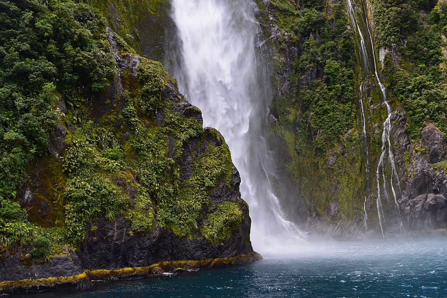 waterfall streaming through lake, beauty in nature, scenics - nature HD wallpaper