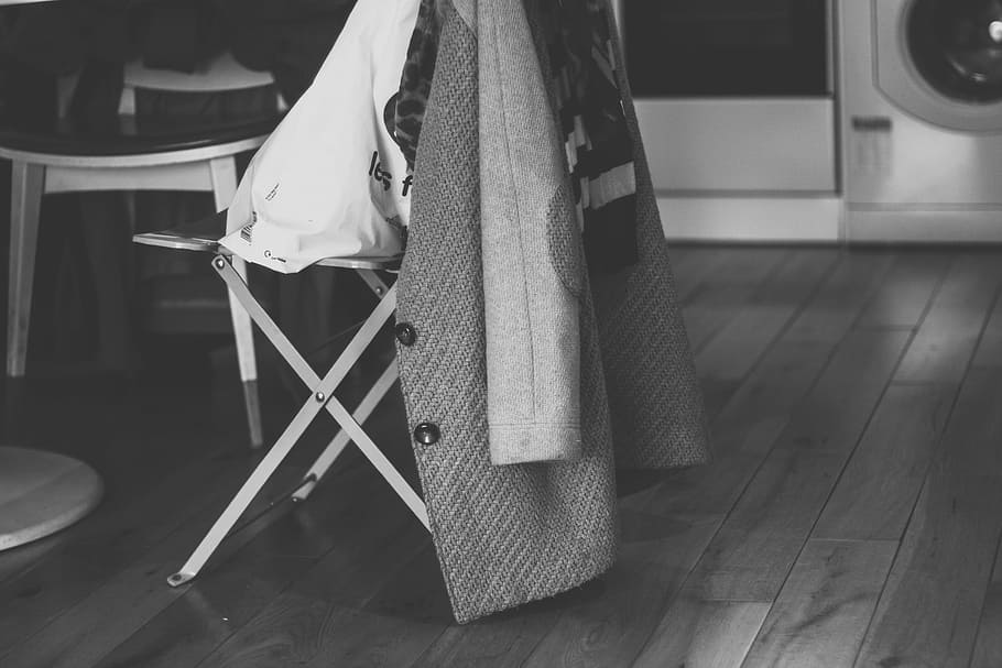 suit jacket and folding chair, monochrome, wooden, bokeh, blur