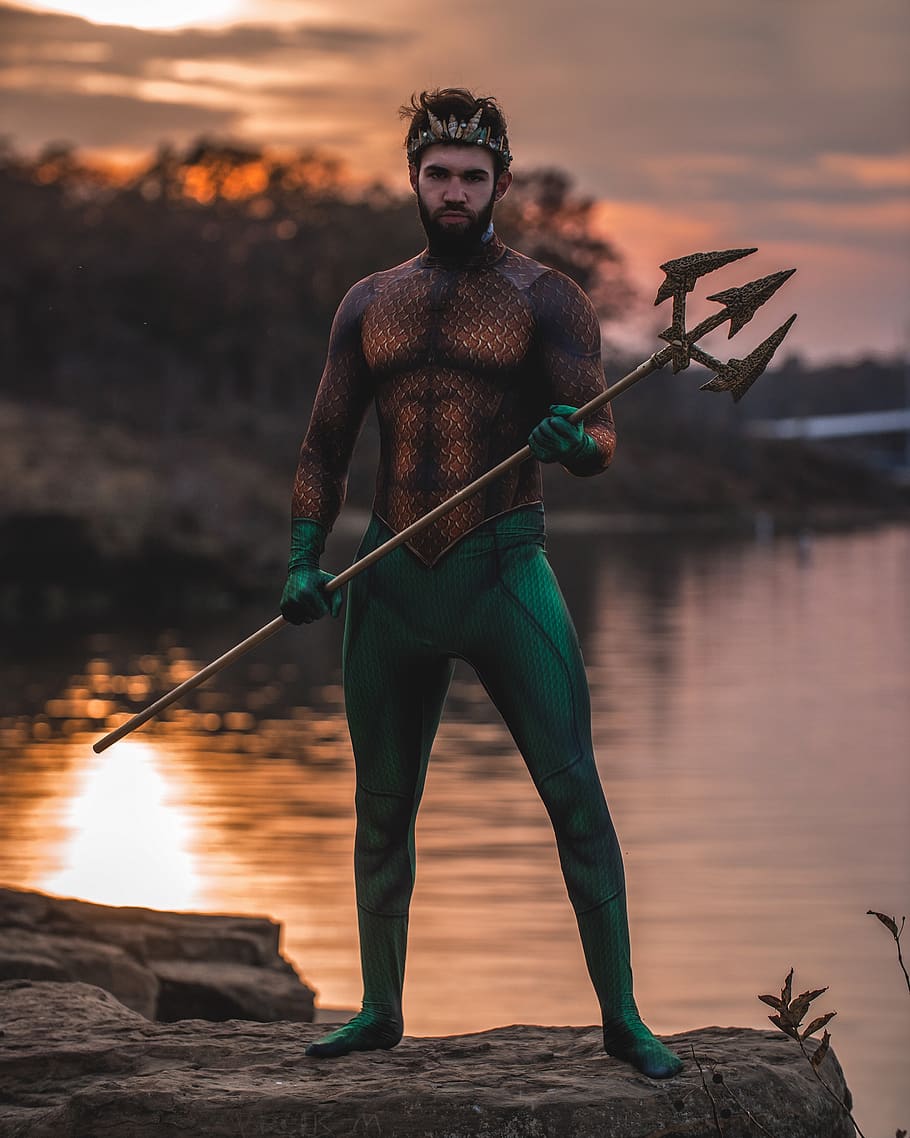 man wearing Poseidon costume standing on rock, water, one person, HD wallpaper