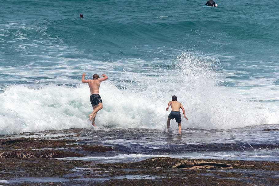 waves, boys, jumping, rocks, ocean, water, sea, motion, lifestyles HD wallpaper