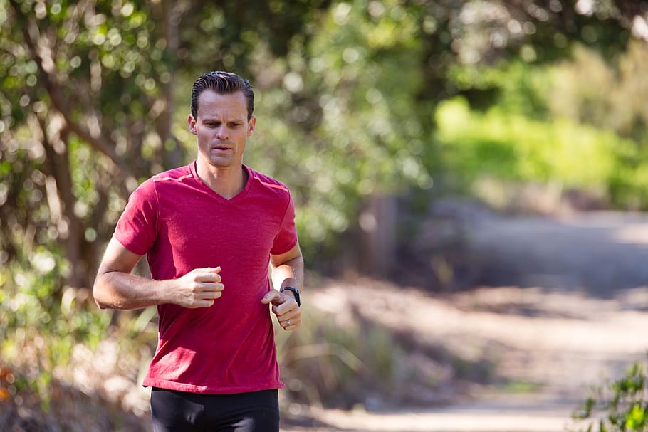 Man Running on Path Surrounded With Trees, active, blurred background HD wallpaper