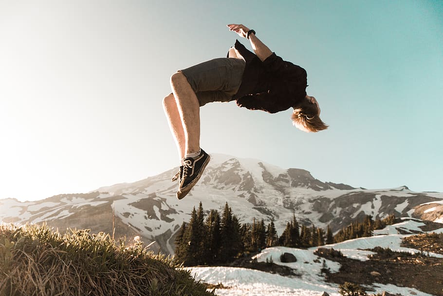 man back tumbling on cliff, one person, mountain, full length HD wallpaper