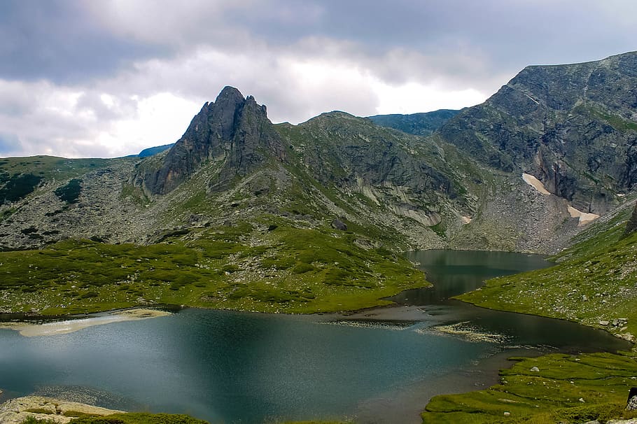 landscape, mountains, hills, cliffs, grass, river, water, clouds HD wallpaper