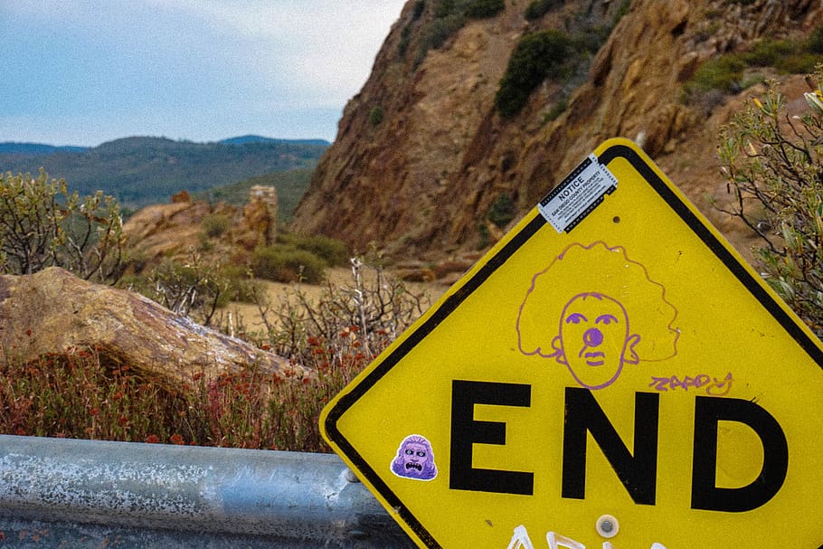 end, rock, cliff, gate, graffiti, yellow, boulder, nature, adventure HD wallpaper