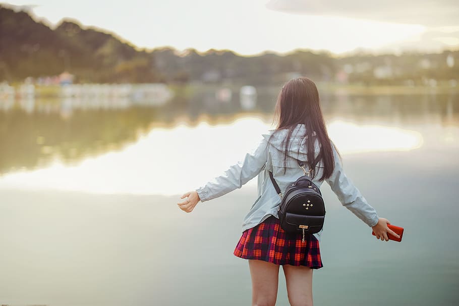 Selective Focus Photography of Girl Near Body of Water, backpack, HD wallpaper