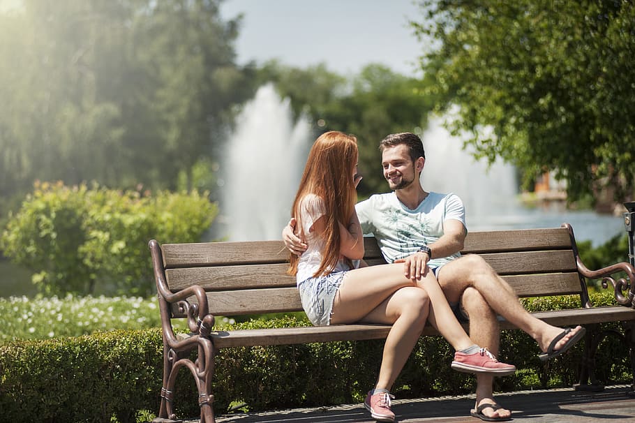 Man and Woman Sitting on a Bench, adults, affection, beautiful
