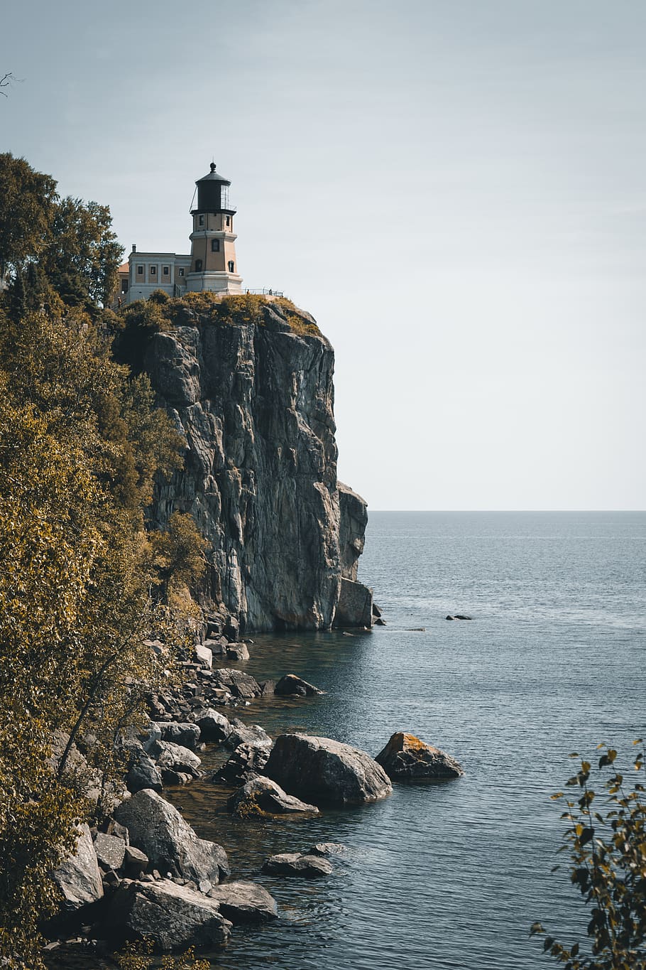 lighthouse above cliff near seashore, beacon, outdoors, united states