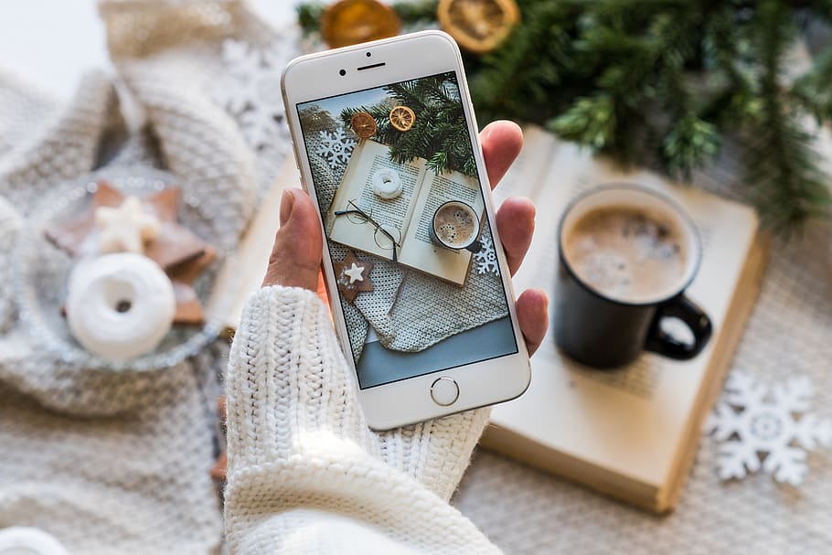 Person Holding Iphone, coffee, cup, drink, flatlay, screen, smartphone HD wallpaper