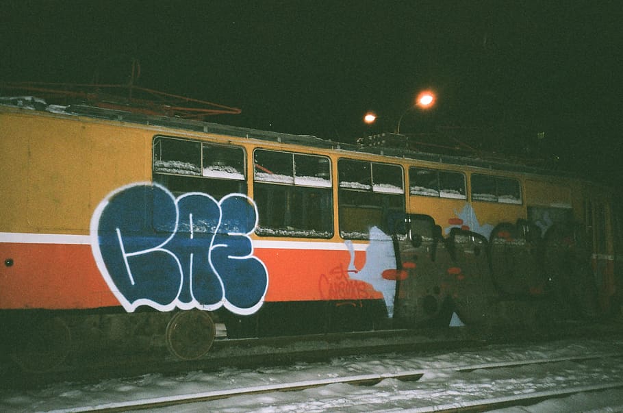 Yellow and Rd Train Ta Night, dark, graffiti, iron, landscape