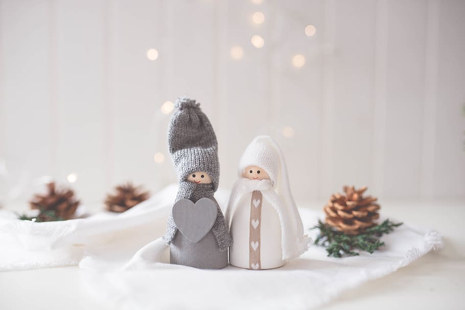two figurines near pinecones, clothing, apparel, doll, toy, hat HD wallpaper