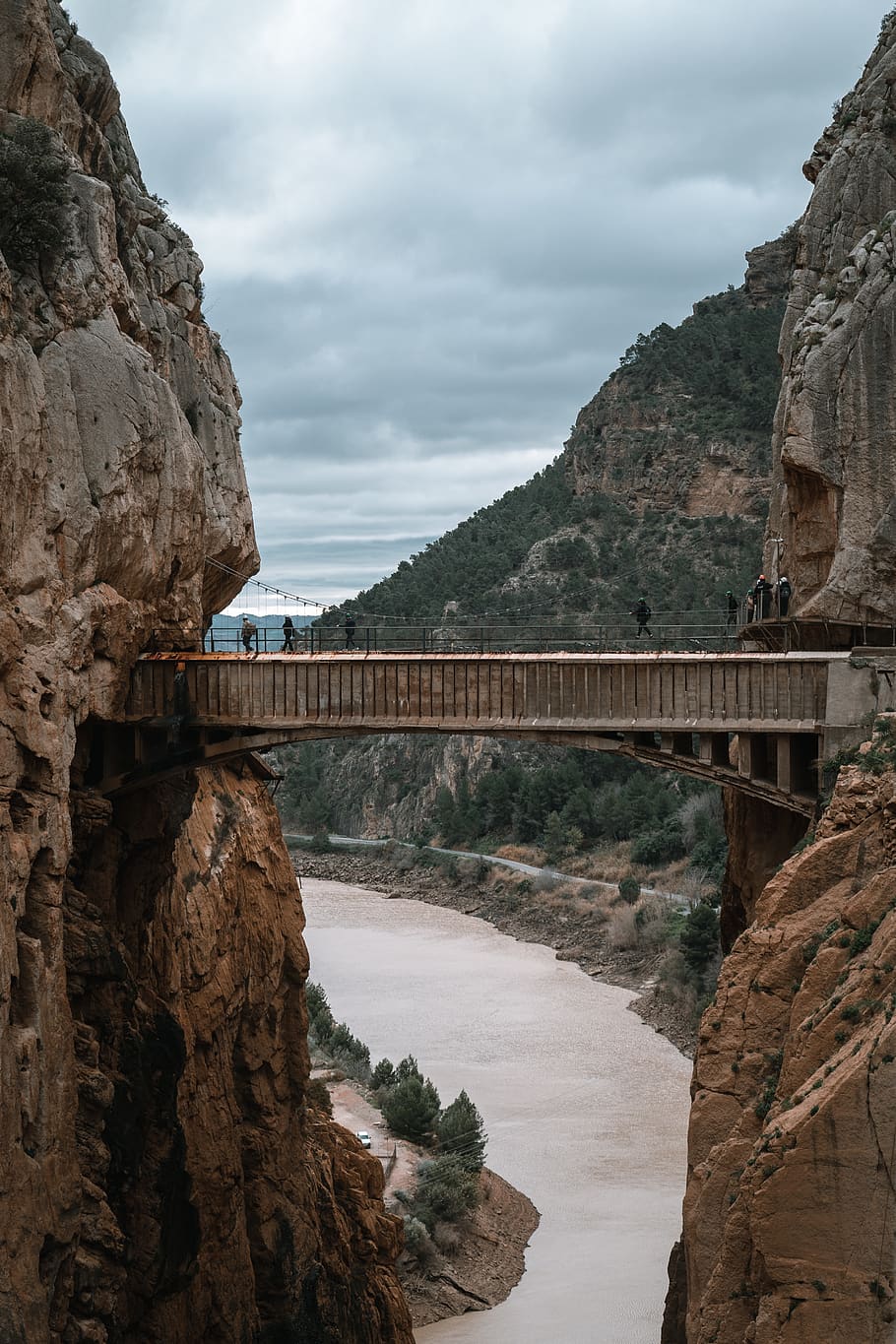 brown bridge between rock formation, connection, built structure HD wallpaper