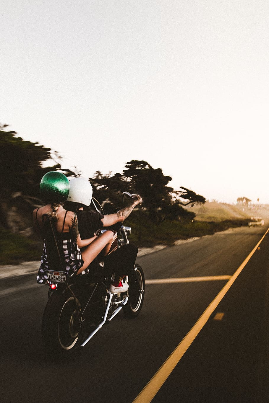 man driving on motorcycle with woman, harley davidson, bike, highway, HD wallpaper