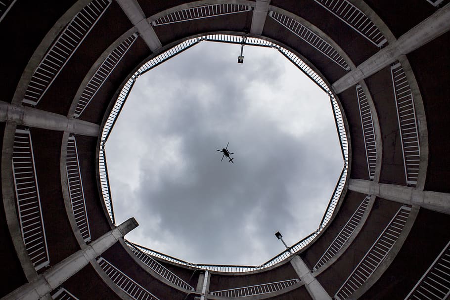 brown tower building, heli, copter, sky, looking up, helicopter HD wallpaper