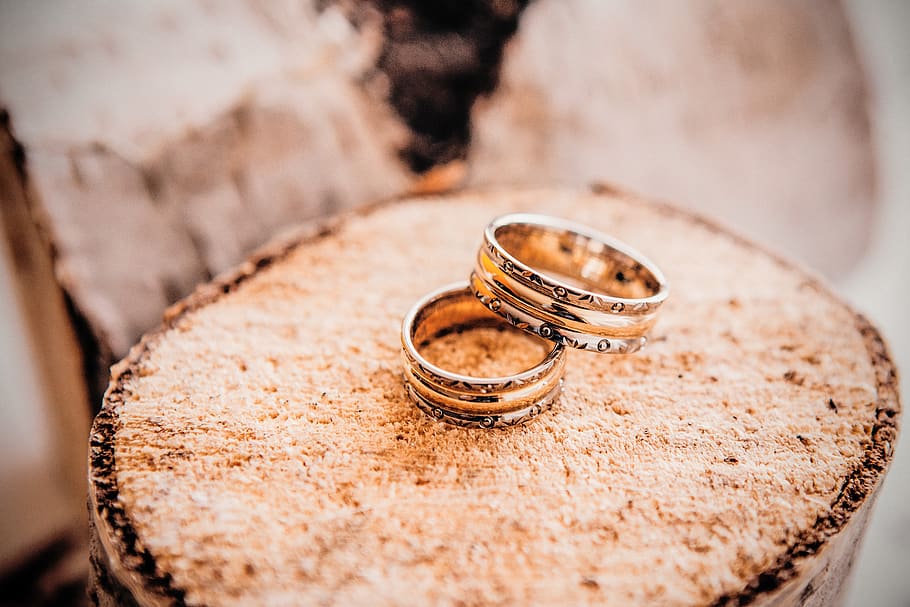 Wedding rings with tender spring background Stock Photo | Adobe Stock