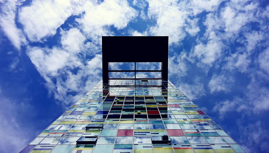 Low Angle Photography of Glass Building Under White Cloud and Blue Sky during Daytime HD wallpaper