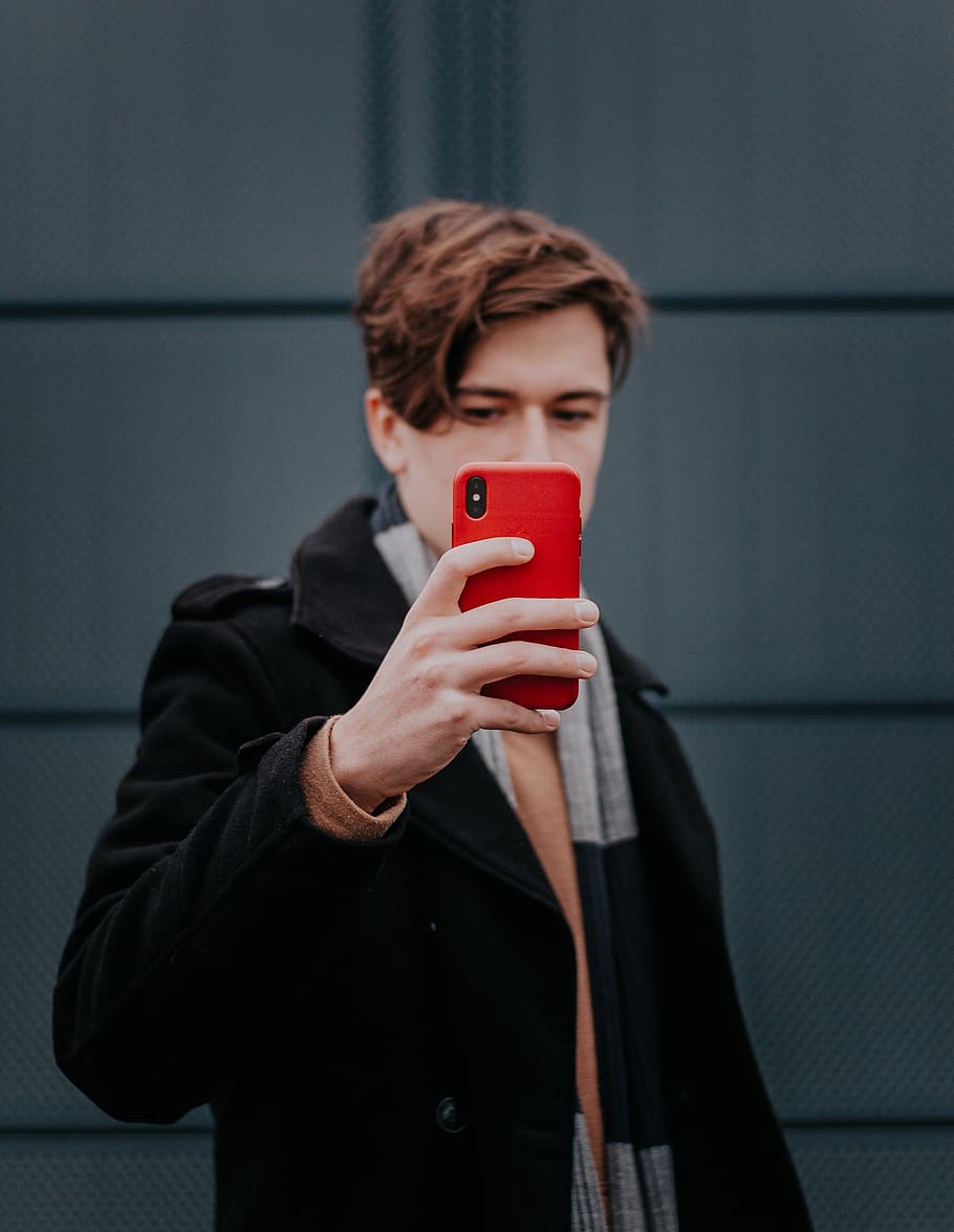 man holding iPhone, one person, wireless technology, mobile phone HD wallpaper