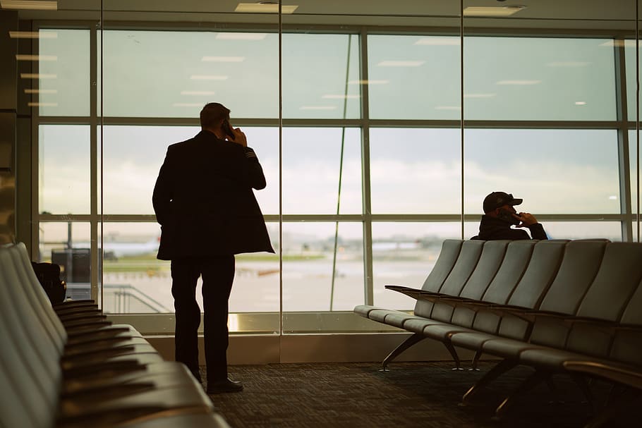 man standing and using phone, window, full length, seat, real people HD wallpaper
