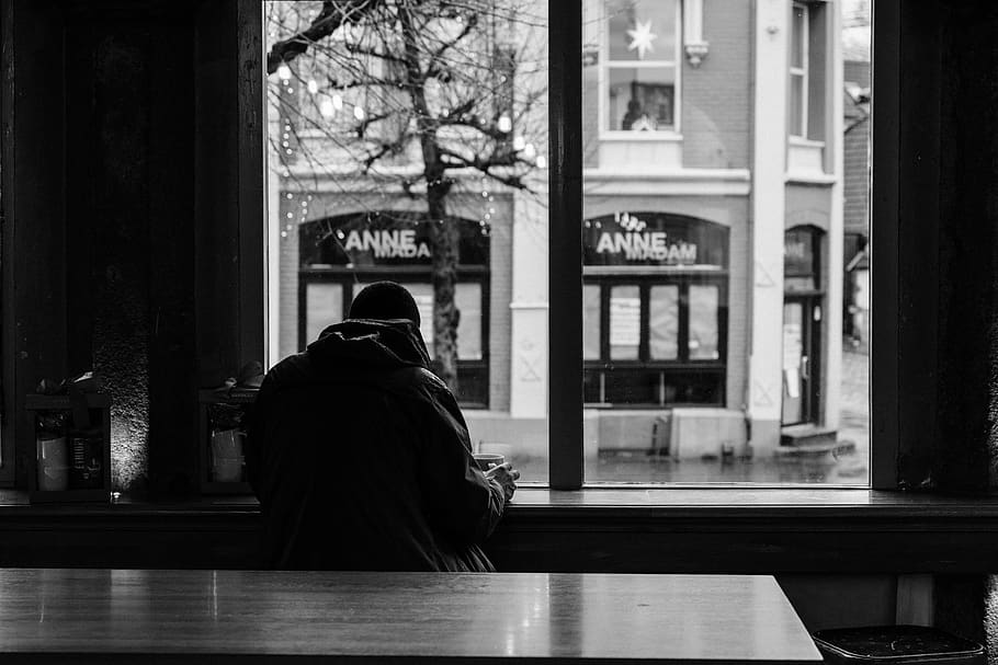 man sitting inside building during daytime, human, person, clothing HD wallpaper