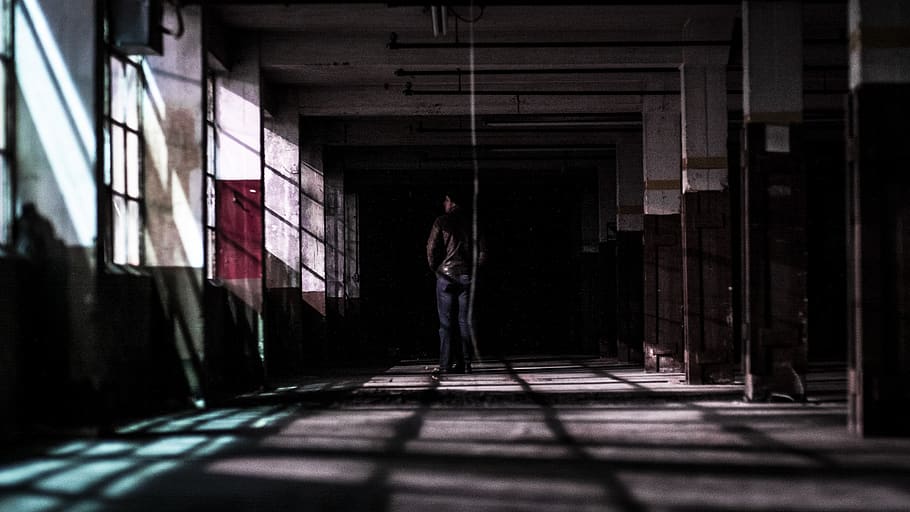 man standing in building, corridor, person, human, nashville