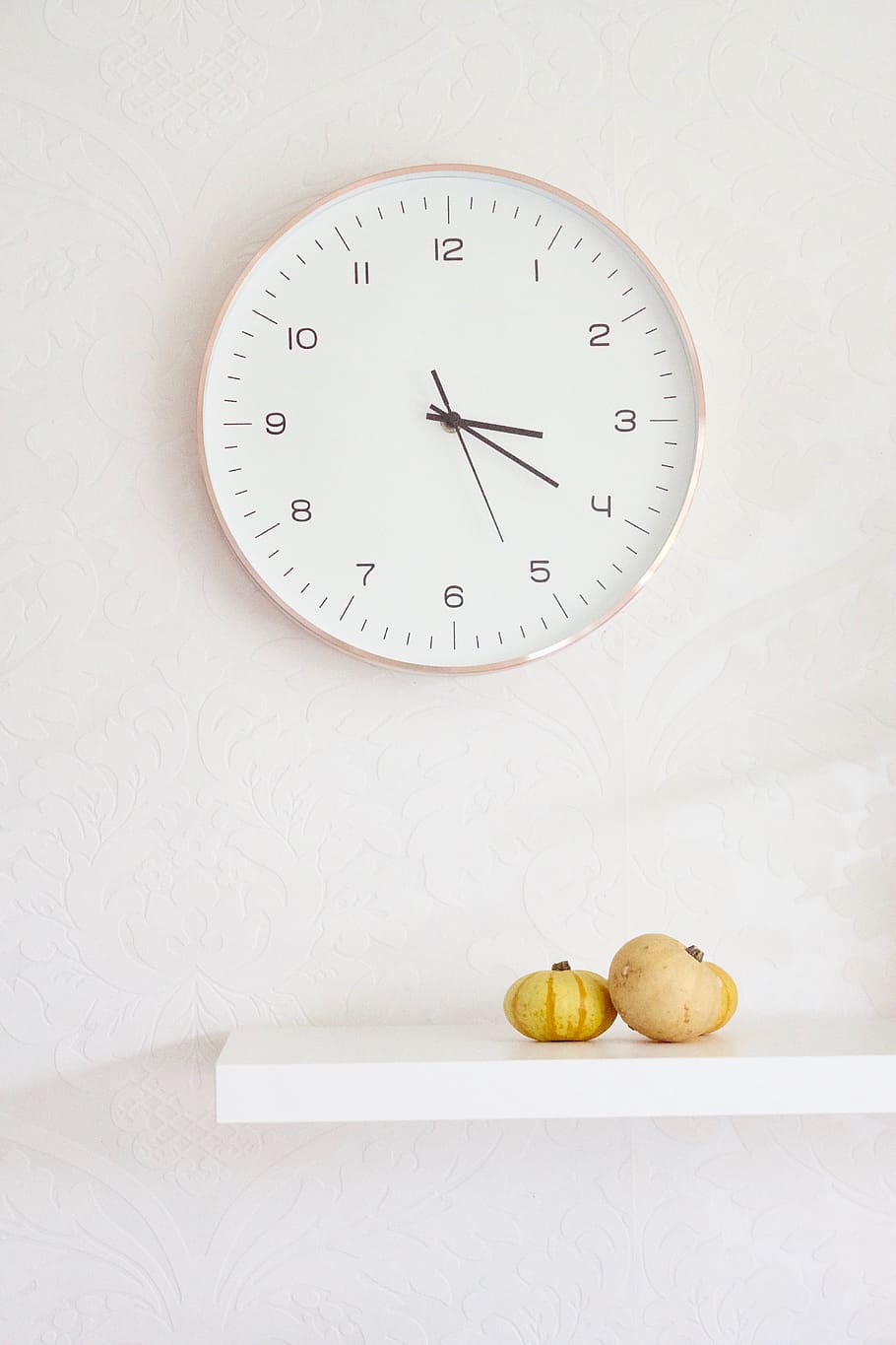 two pumpkins on table below wall clock, time, indoors, no people HD wallpaper