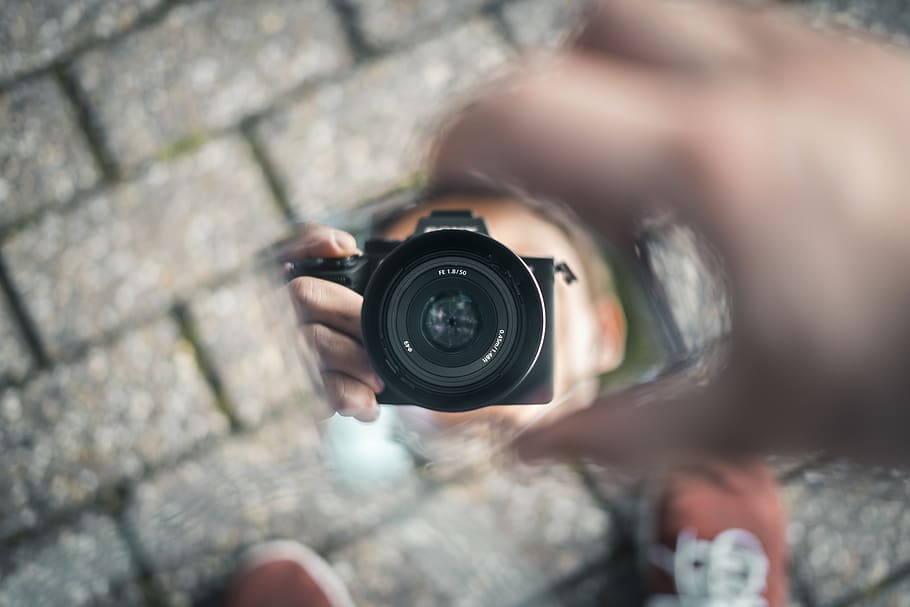 Selective Photo of Person Holds Black Dslr Camera, digital camera HD wallpaper