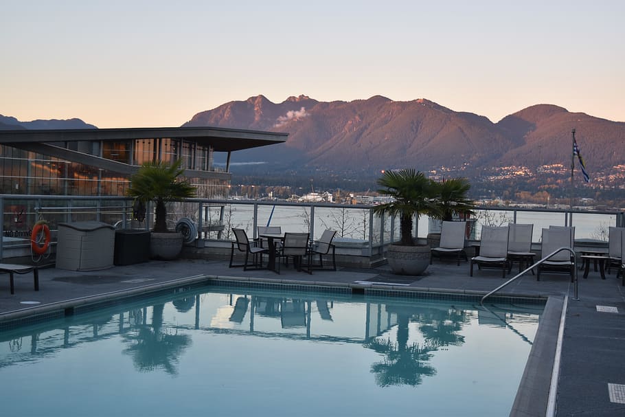trees, pool, christmas, sunset, mountains, reflections, city HD wallpaper