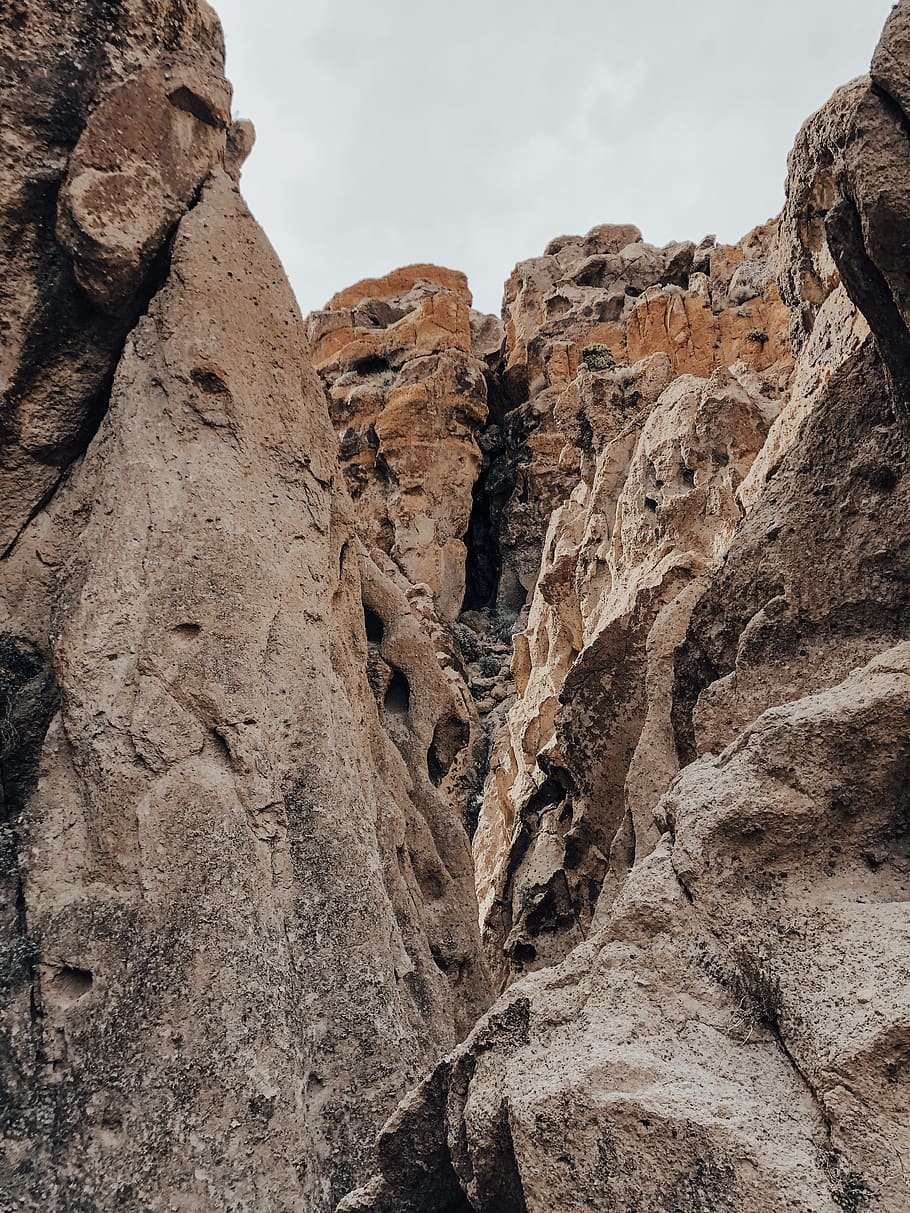 brown cliff mountain, cavern, hiking, californium, lava rock HD wallpaper