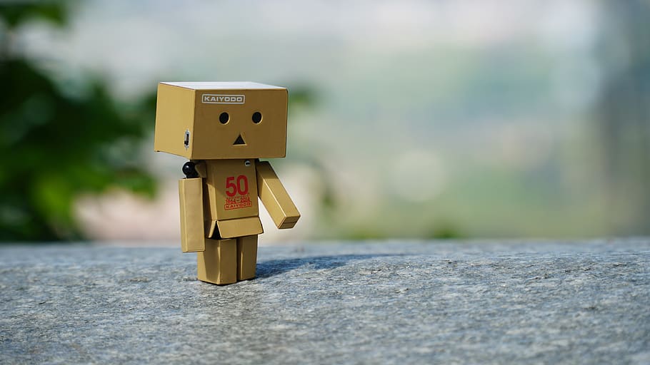 toy, box toy, boxes, stone, outdoors, figurine, robot, representation HD wallpaper
